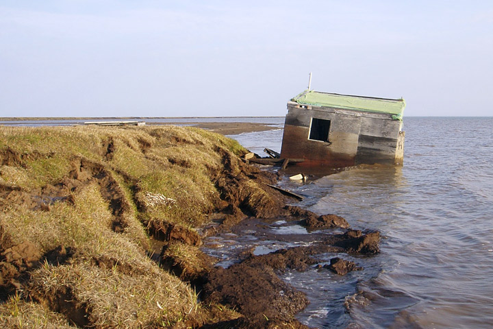 Photograph of coastal erosion on the Arctic Sea.