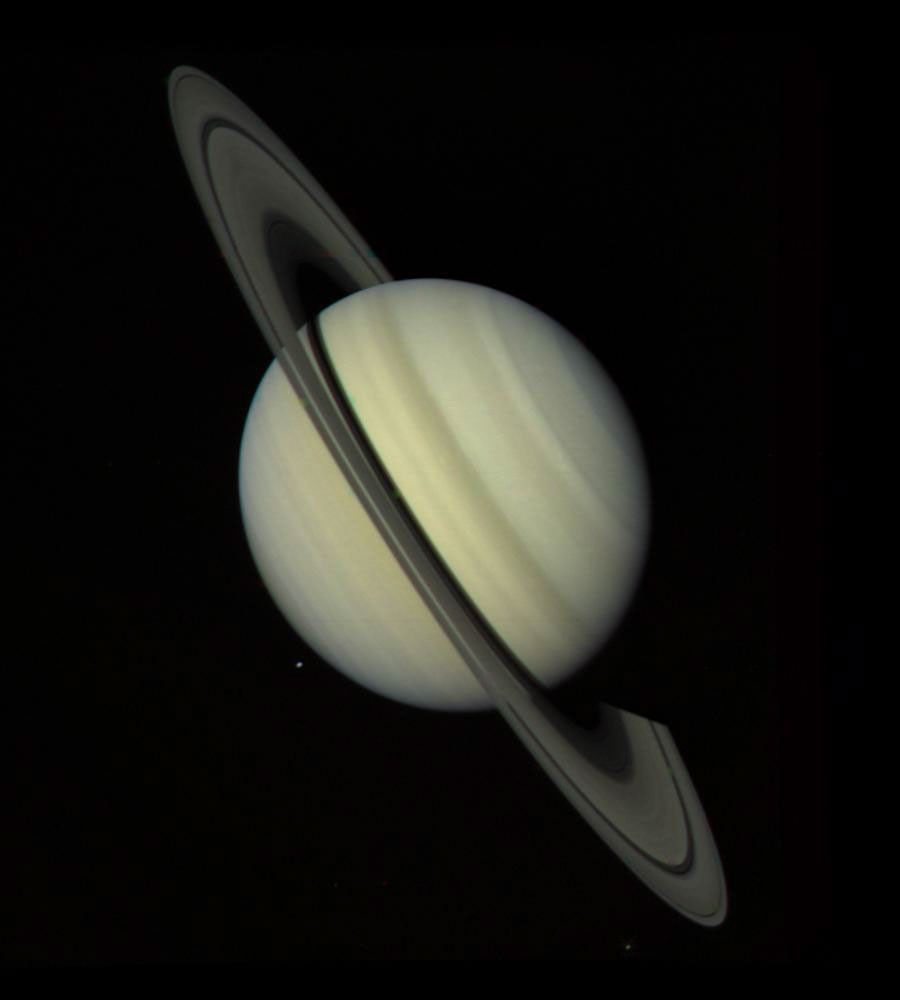 Saturn and its rings appear tilted in this image from Voyager 1.